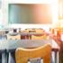 photo of school desks in empty classroom